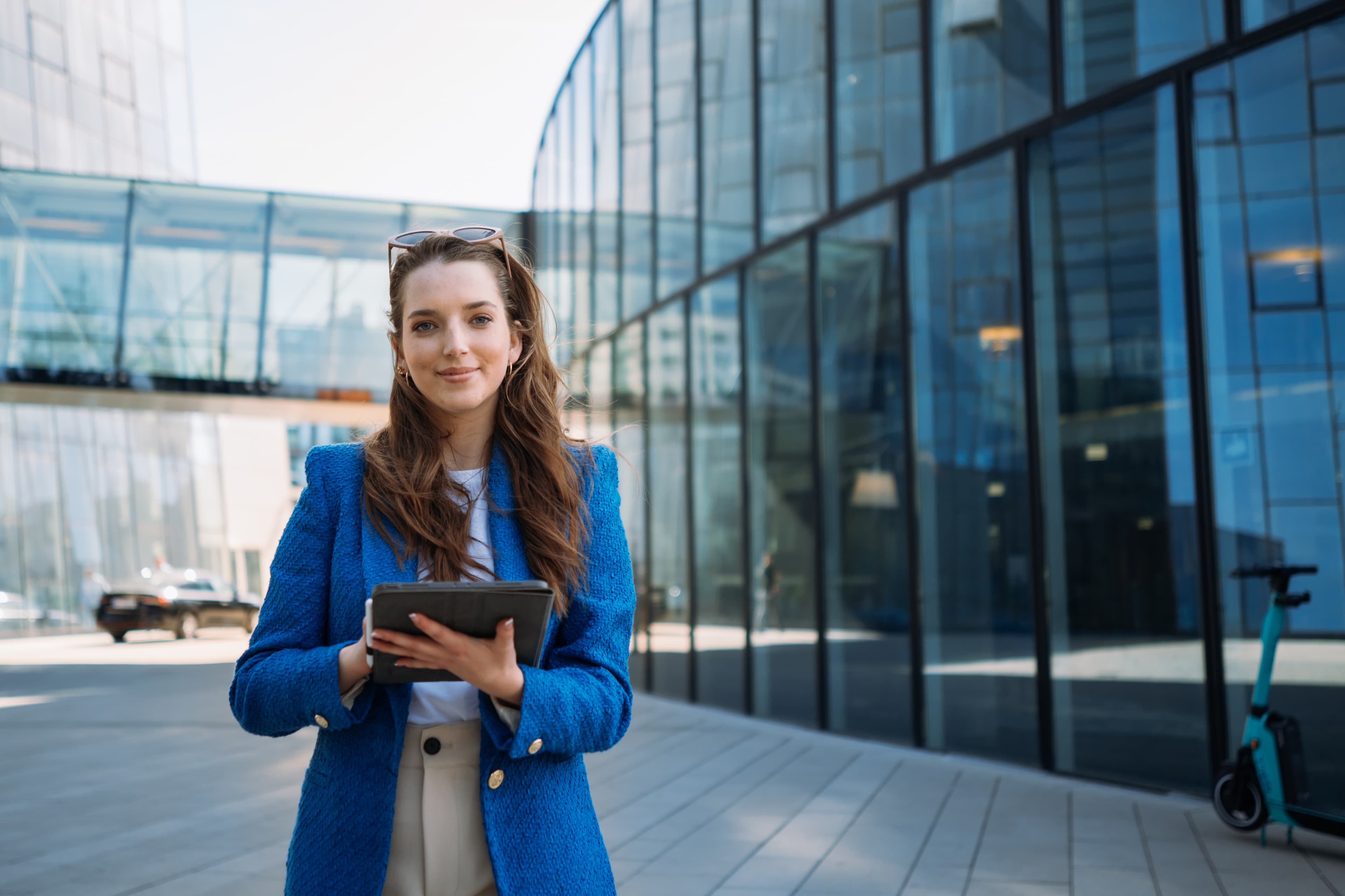 Real estate professional holding a tablet